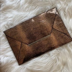 BCBG Metallic Envelope Clutch
